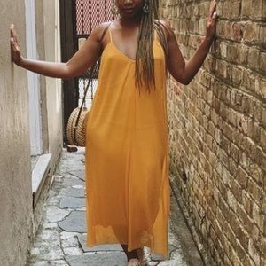 Pleated orange organza dress from Zara